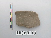 藏品(灰黑色夾砂陶口緣)的圖片